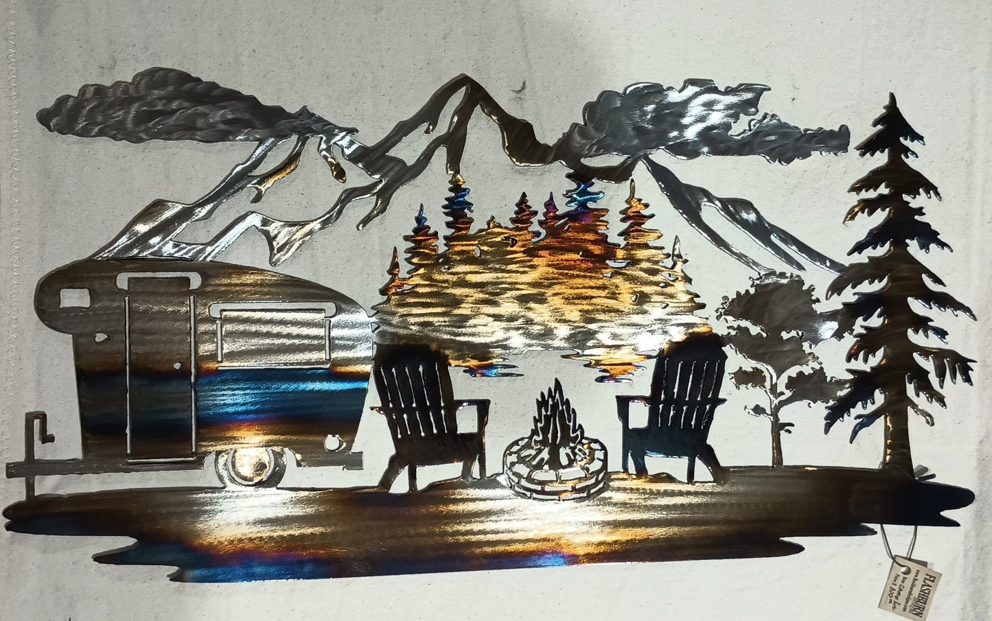 Camping in the mountains around a fire.